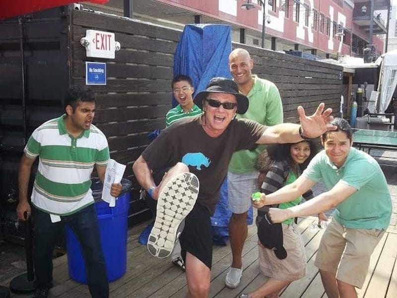 A cityHUNT team celebrating and posing together outdoors